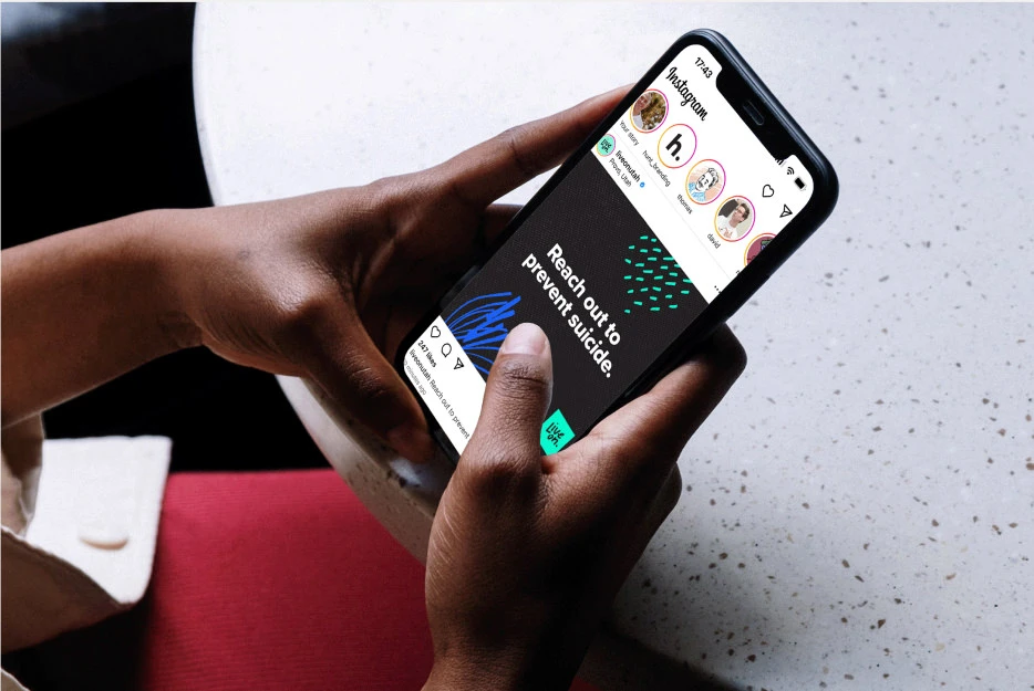 a phone showing the instagram post of liveonutah