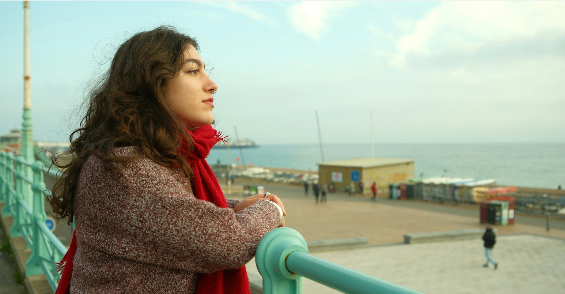 a woman looking out to sea
