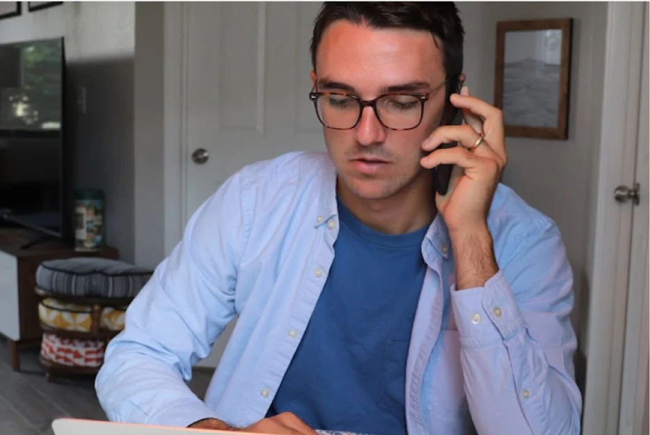a man talking on a phone